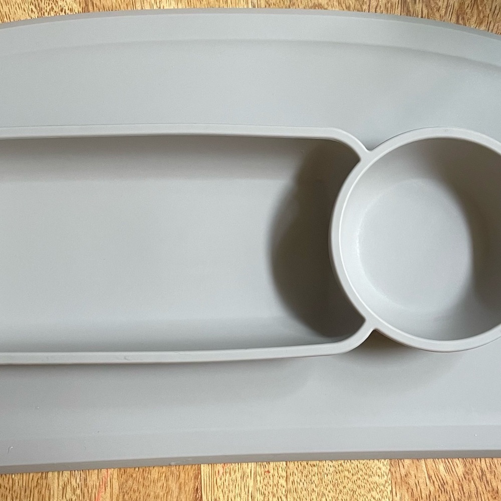 EZPZ Stokke EUC Gray Silicone Dining Tray and blue spoon